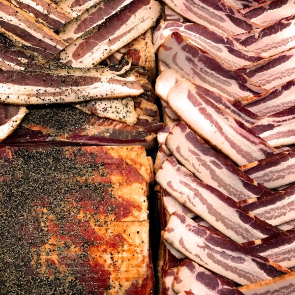a pile of bacon sitting next to each other